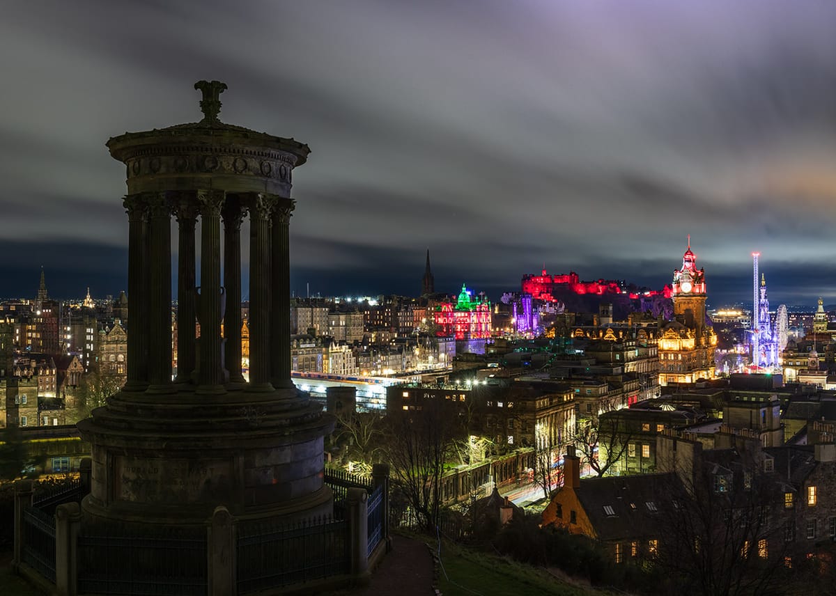 A city at night seen from a high vantage point. 